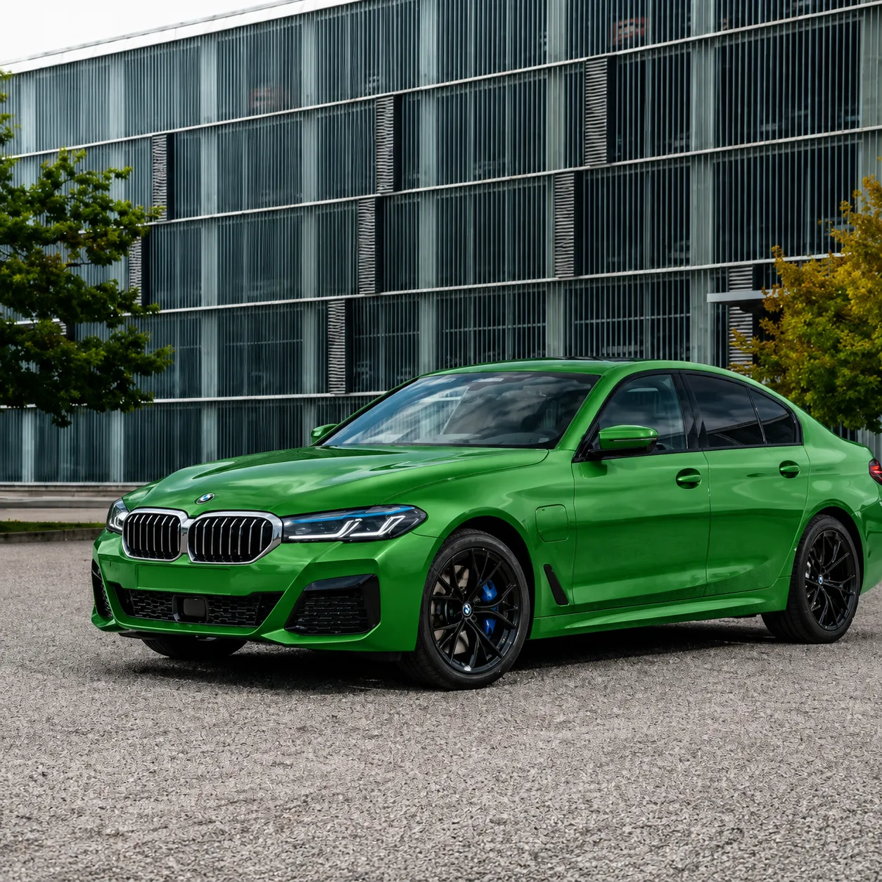 Gloss Green vinyl wrap on BMW 5 Series