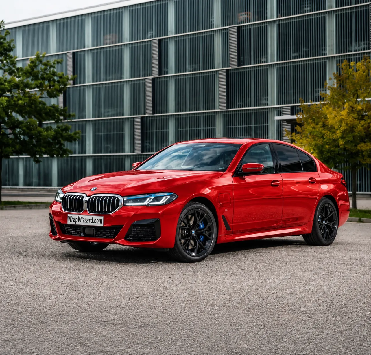 Gloss Red vinyl wrap on BMW 5 Series