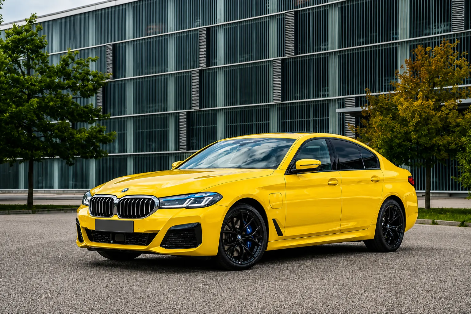 Gloss Yellow vinyl wrap on BMW 5 Series