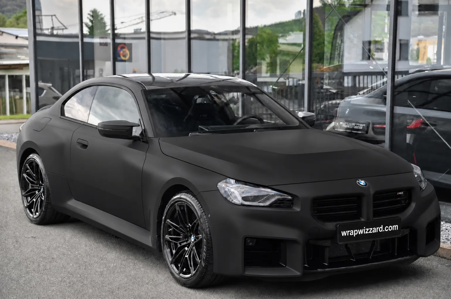 BMW M2 in matte black vinyl wrap