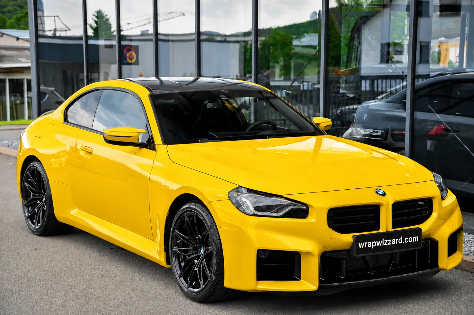 Gloss Yellow vinyl wrap on BMW M2
