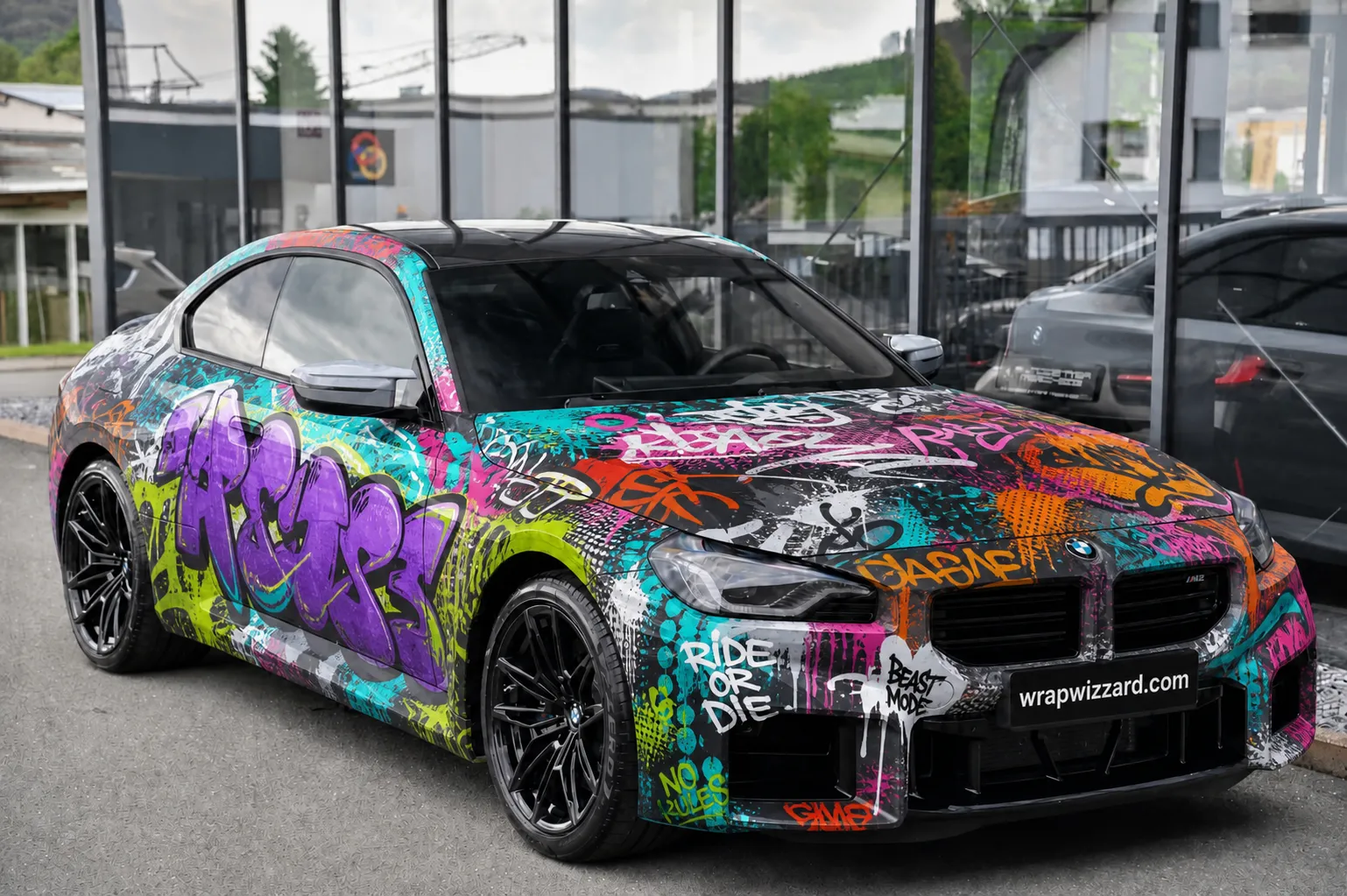 Custom Graffiti vinyl wrap on BMW M2