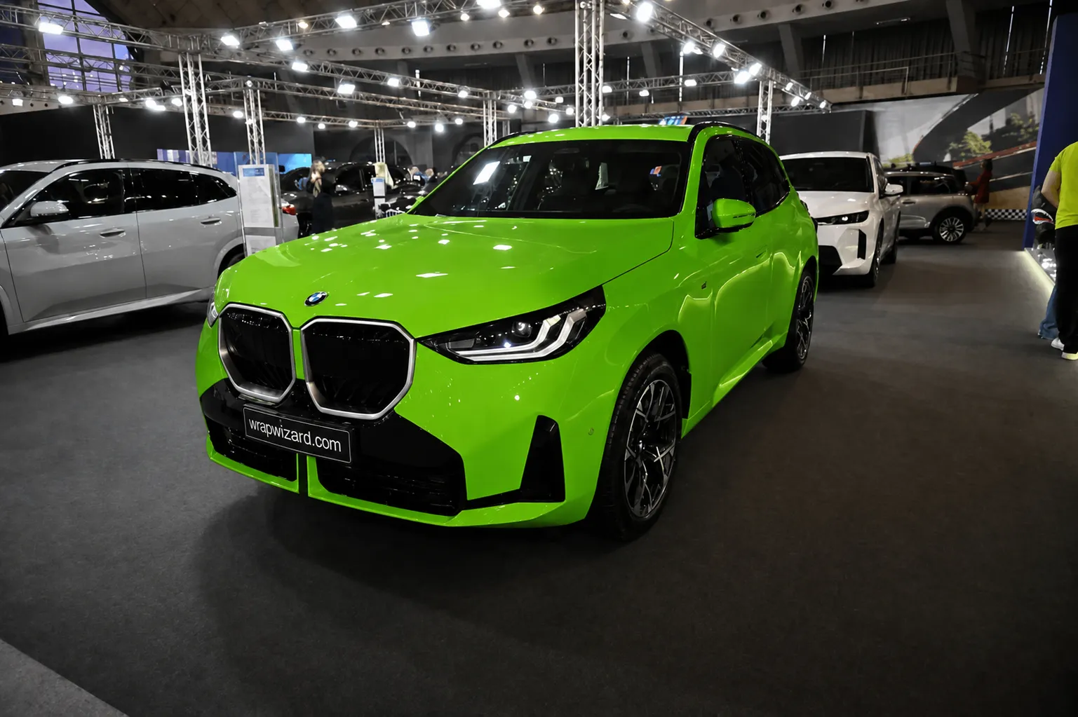 Gloss Green vinyl wrap on BMW X3