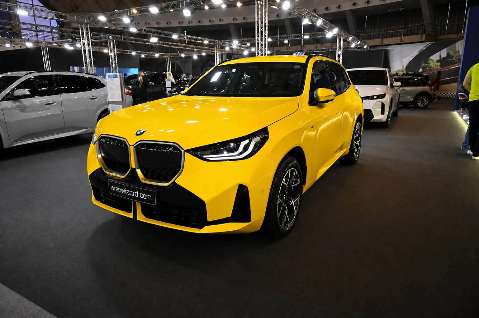 Gloss Yellow vinyl wrap on BMW X3