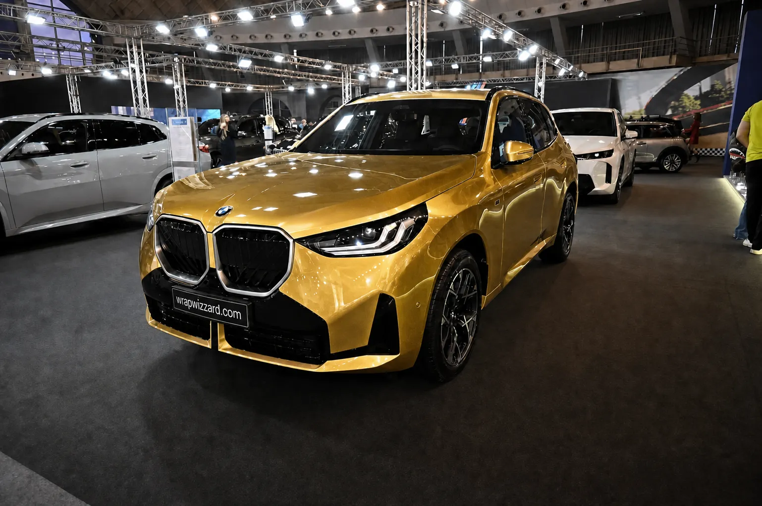 Gloss Gold vinyl wrap on BMW X3