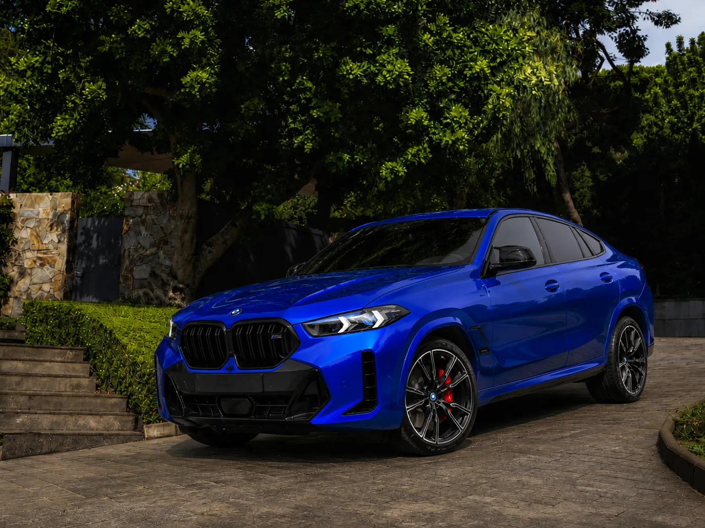 Gloss Blue vinyl wrap on BMW X6