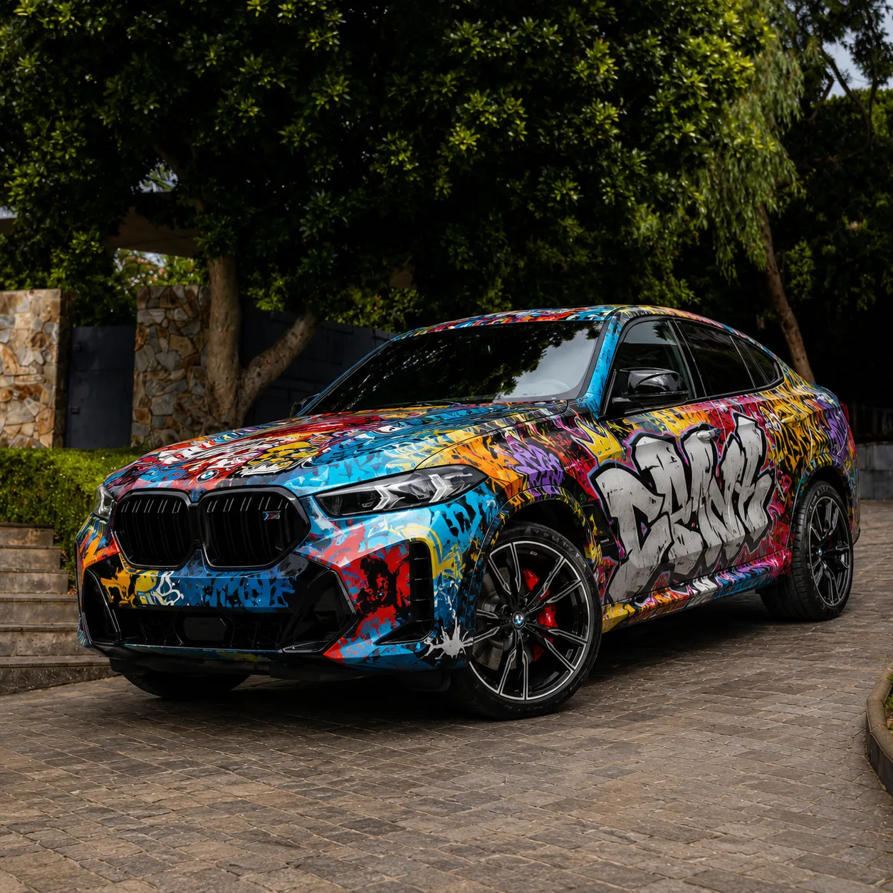 Custom Graffiti vinyl wrap on BMW X6