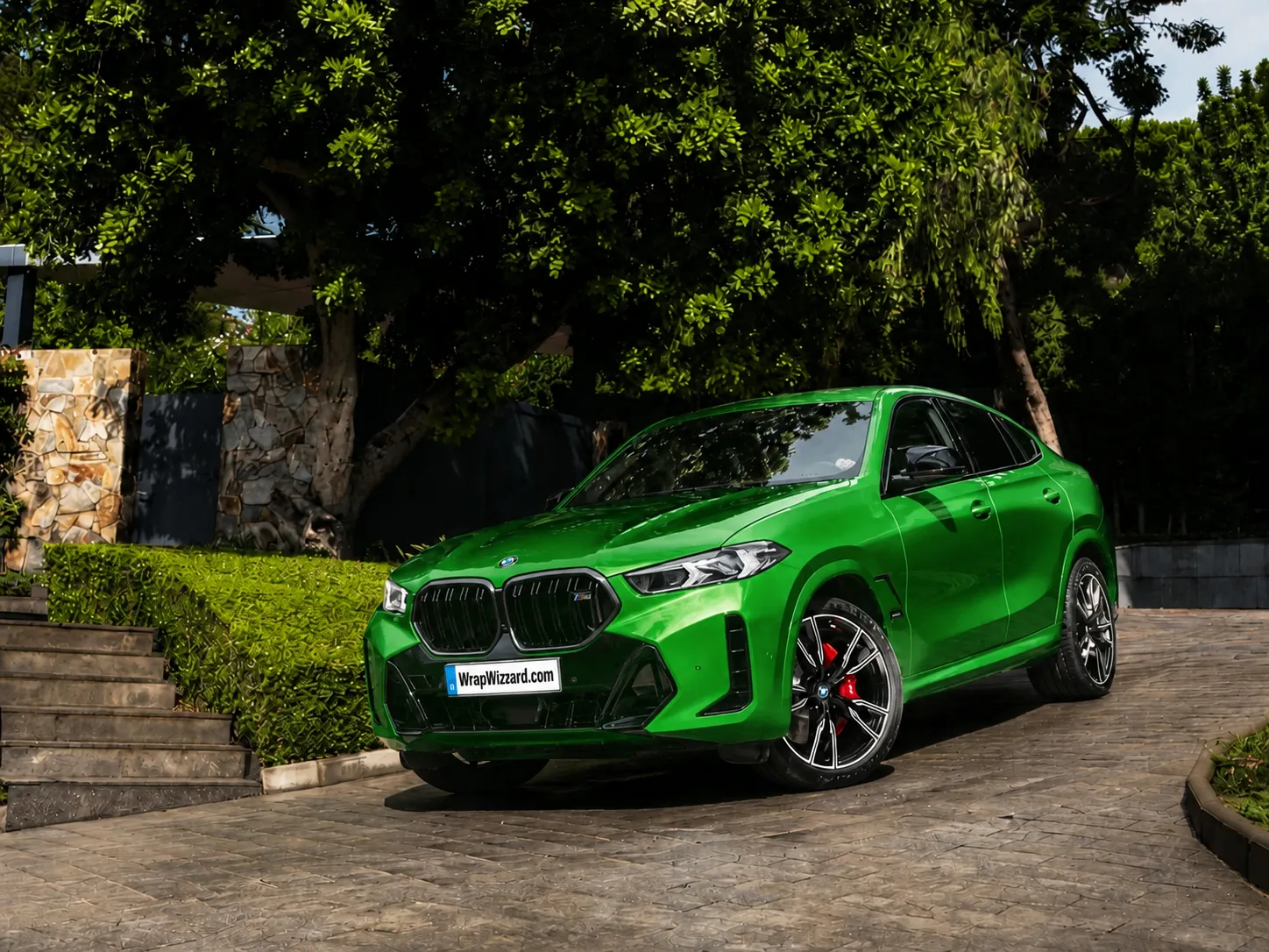Gloss Green vinyl wrap on BMW X6