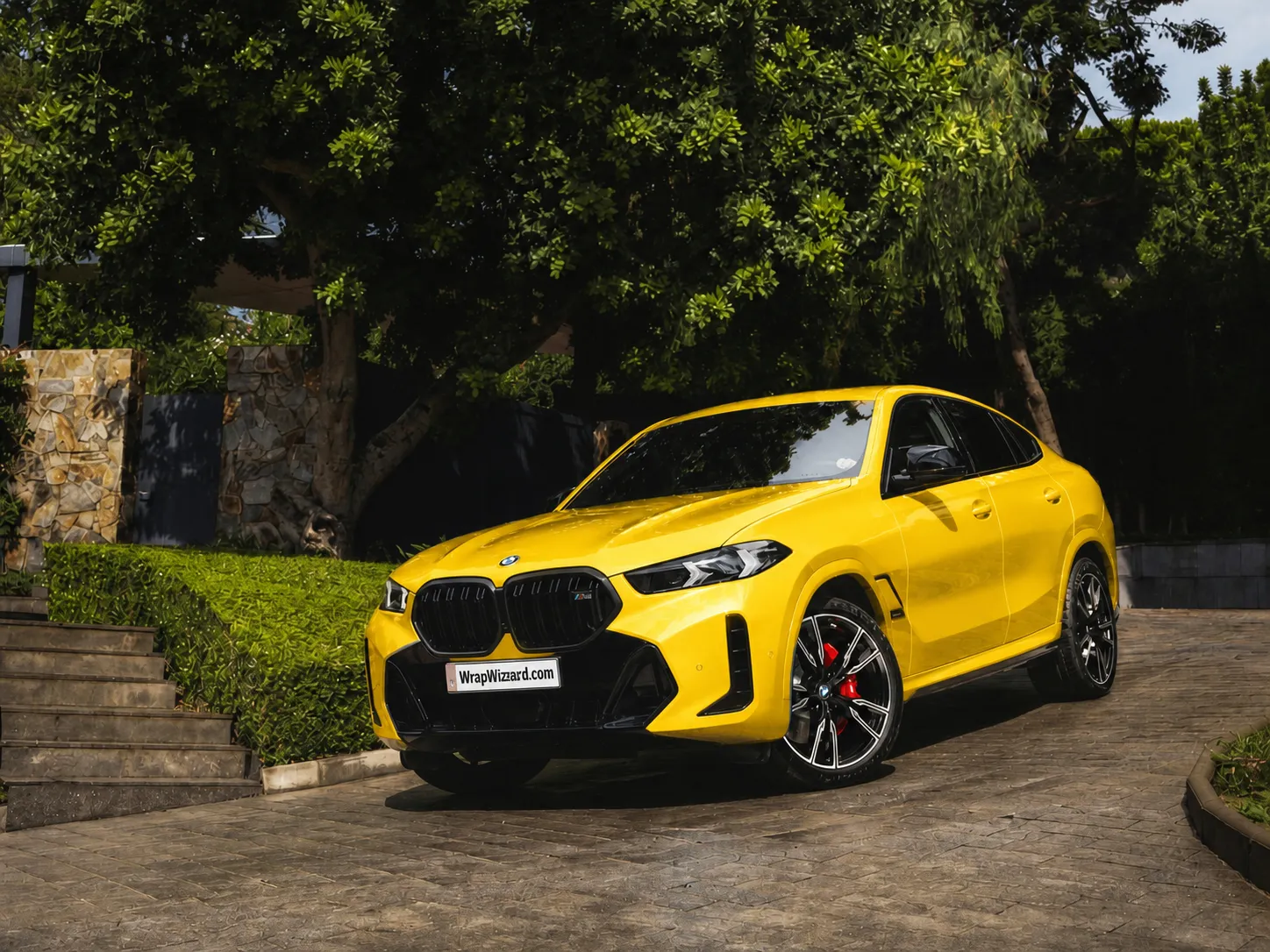 Gloss Yellow vinyl wrap on BMW X6