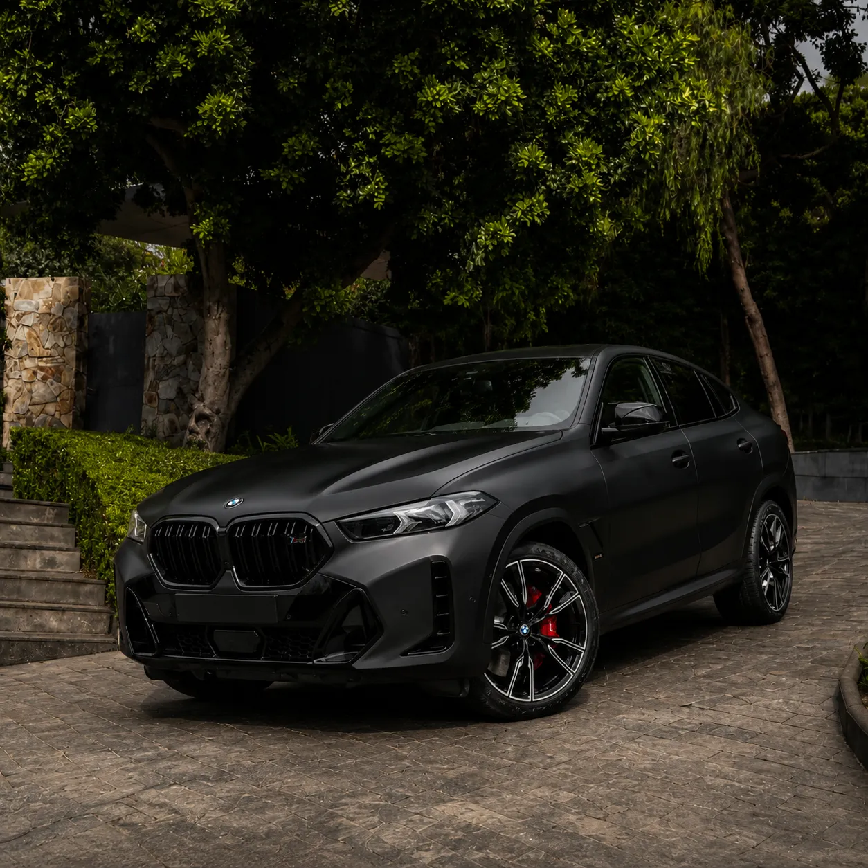 BMW X6 in matte black vinyl wrap