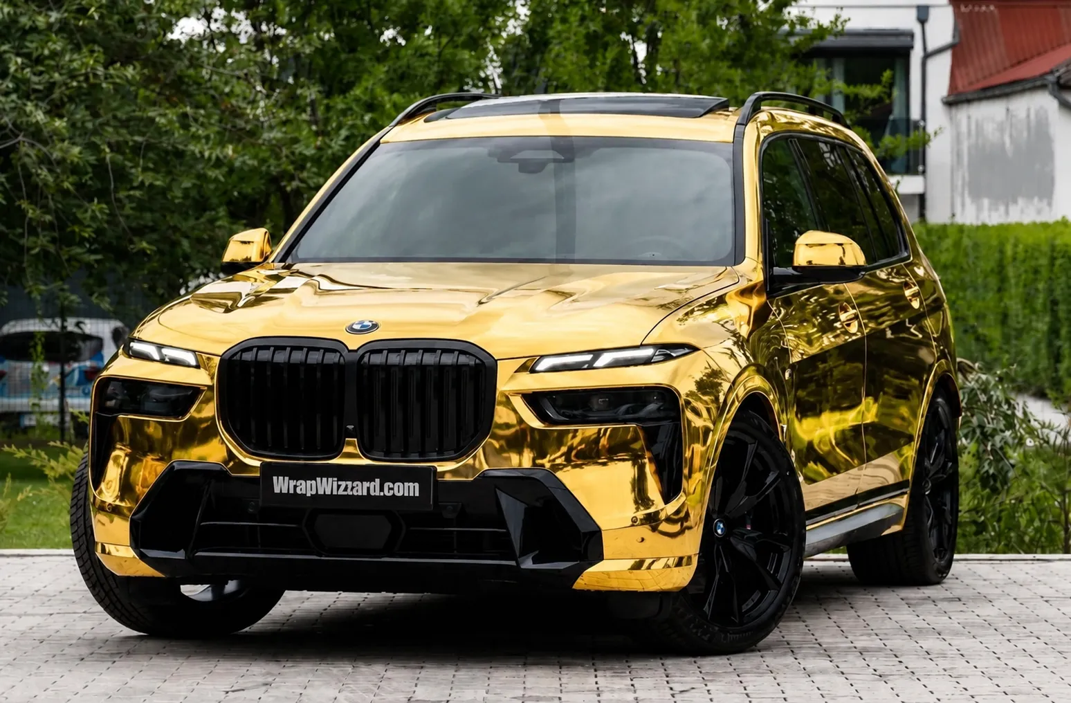 Gloss Gold vinyl wrap on BMW X7