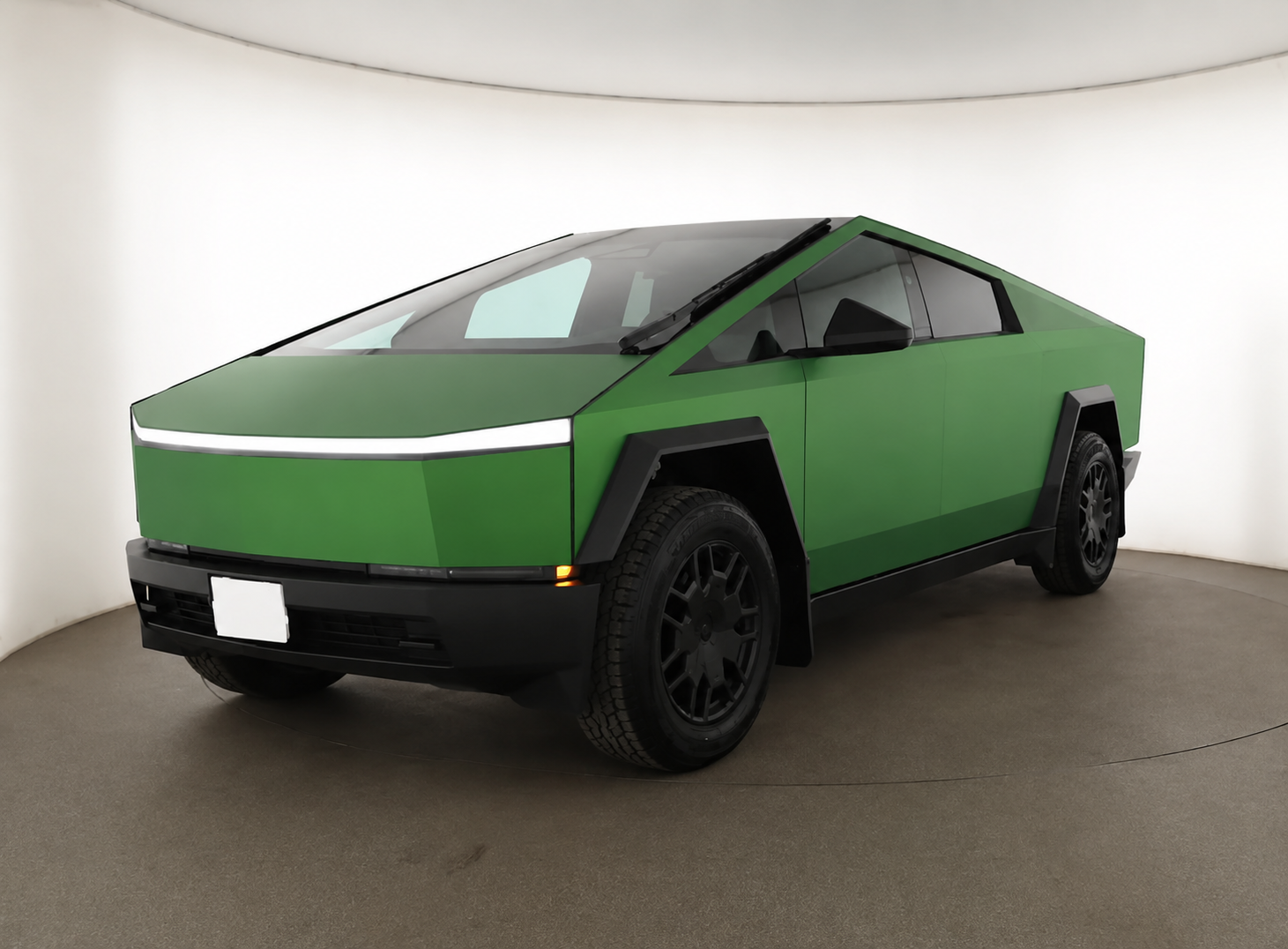 Military Green vinyl wrap on Tesla Cybertruck