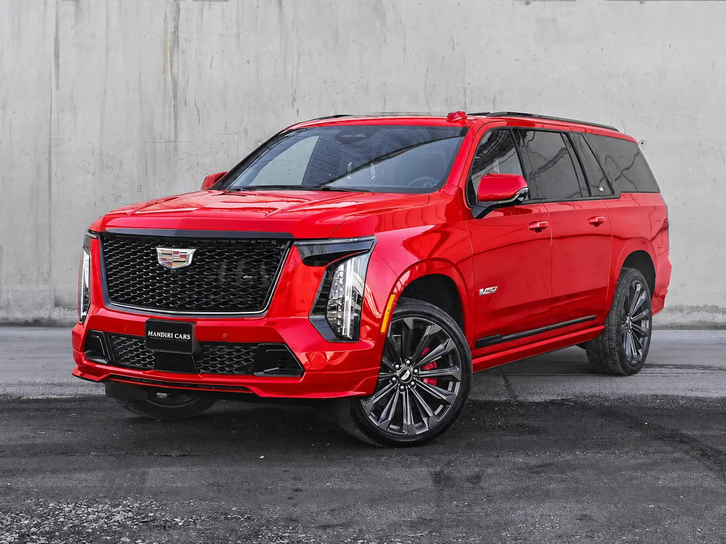 Bright Red gloss vinyl wrap on Cadillac Escalade