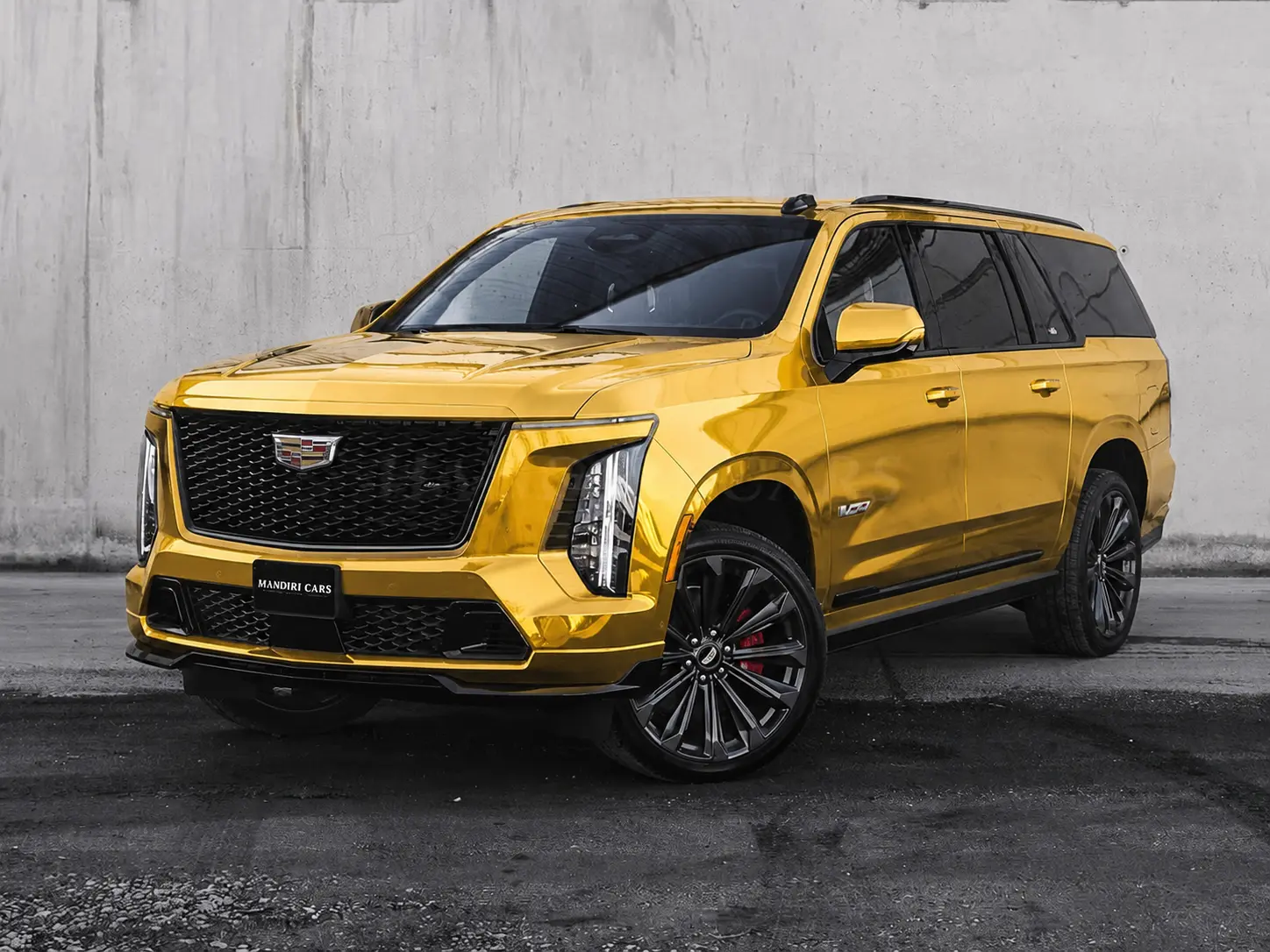 Metallic Gold vinyl wrap on Cadillac Escalade