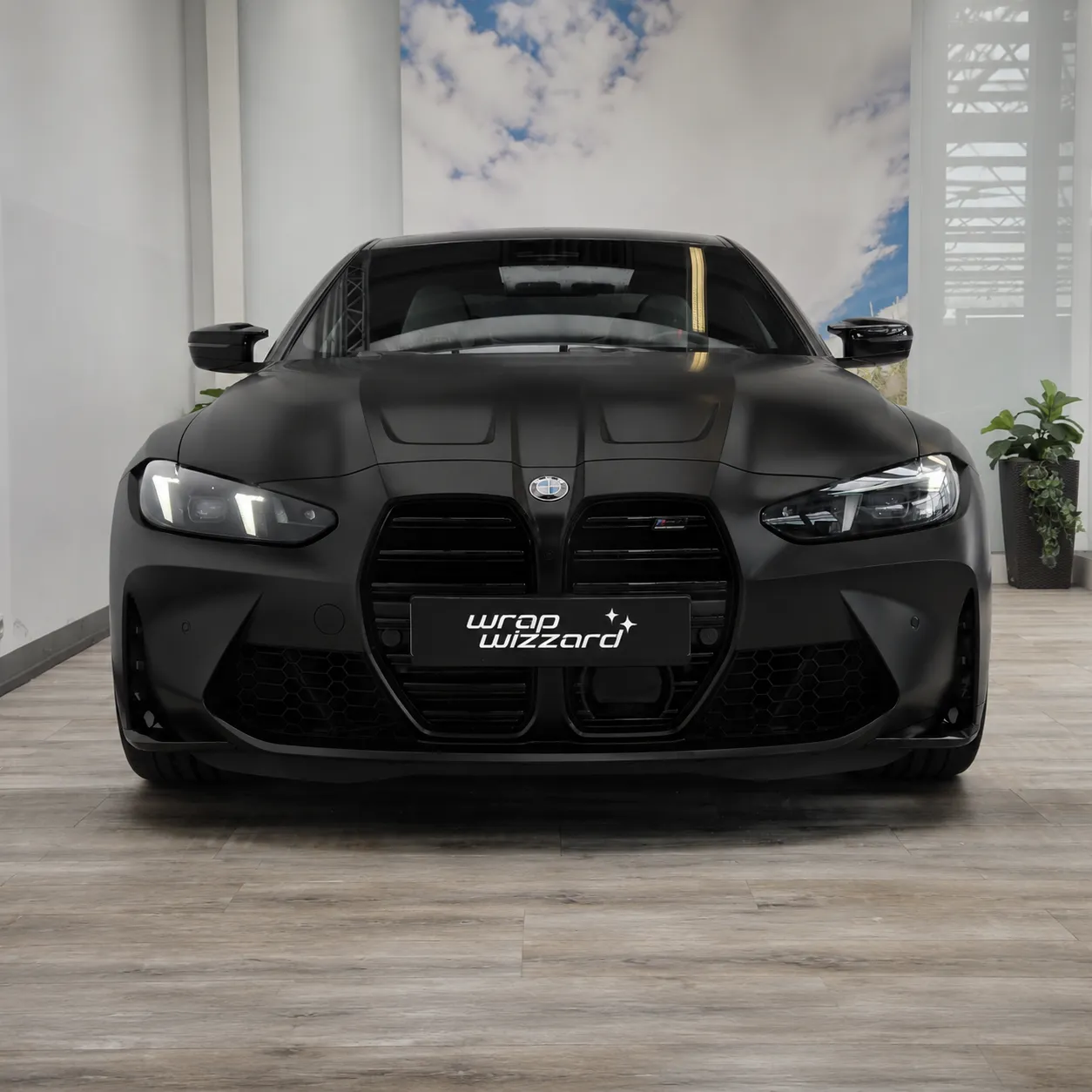 BMW M4 in satin black vinyl wrap